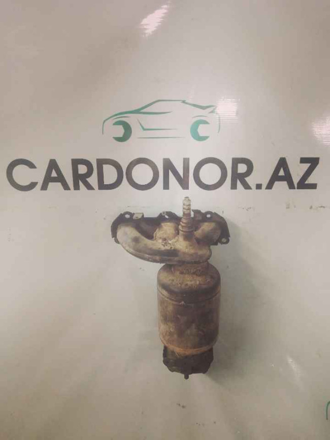 Kollektor (коллектор) выпускной Skoda Fabia 2011